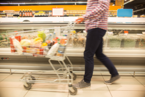 Customer-with-cart-in-supermarket-604383 (1)-1